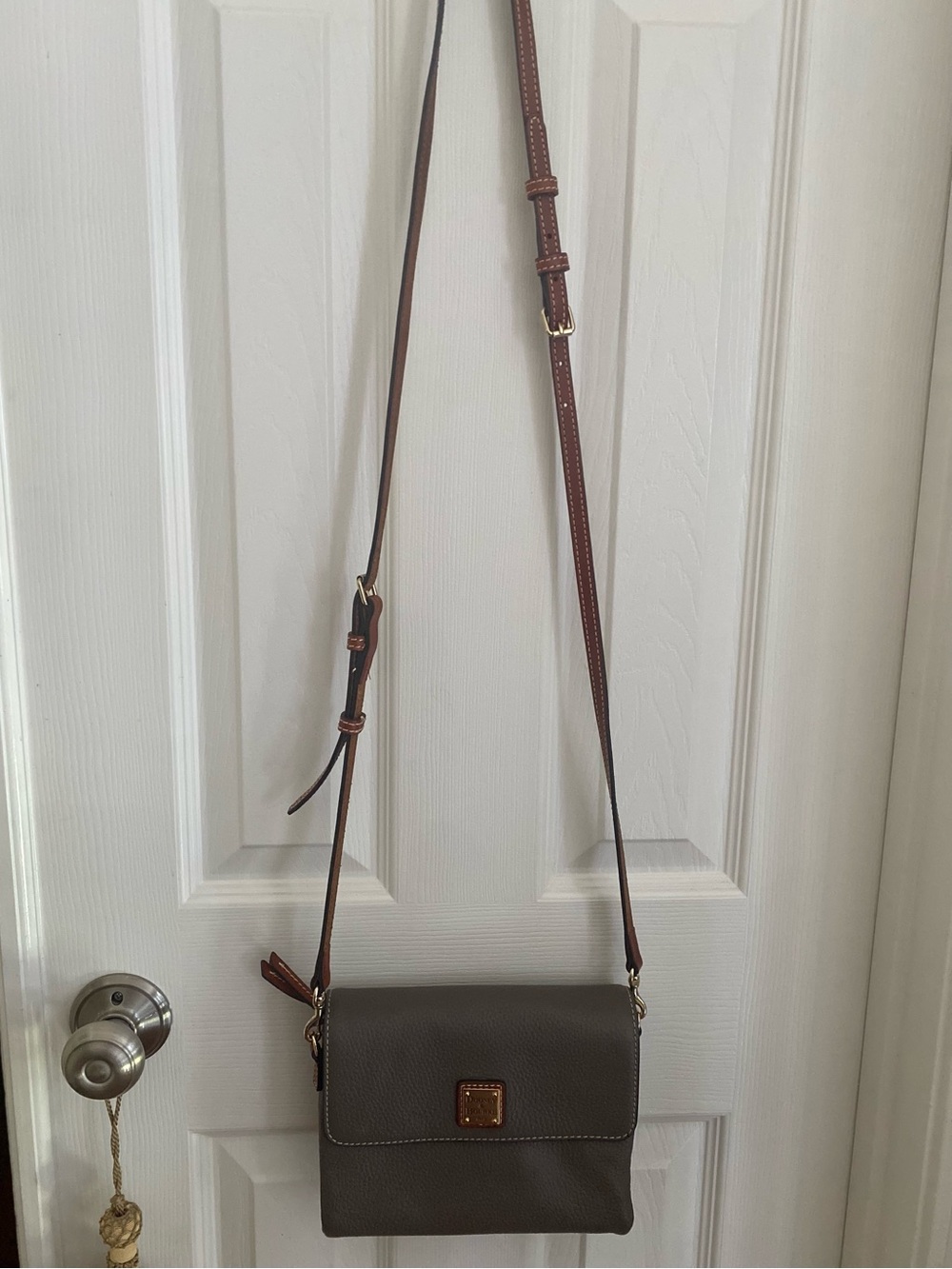 Dooney & Bourke Hunter Crossbody Bag in taupe/elephant gray pebbled leather